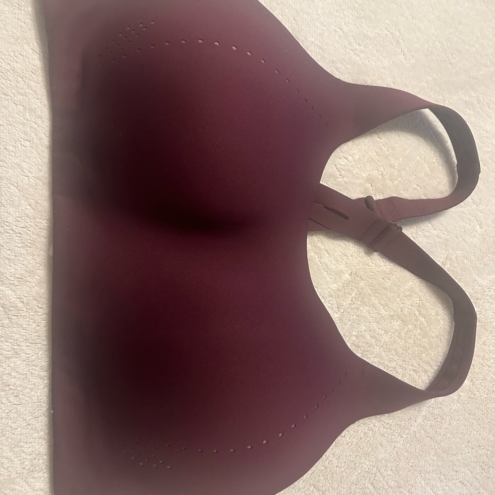 Lululemon like brand new. No flaws at all. Beautiful just too big for me.